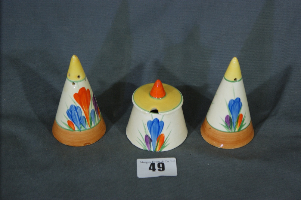 A Rare Clarice Cliff Crocus Pattern Conical Three Piece Cruet Set