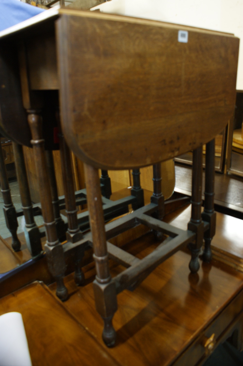 A Polished Oak Drop Leaf Occasional Table