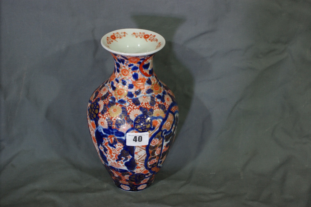 A Circular Based Imari Pottery Baluster Vase With Tree And Floral Decoration, 10" High
