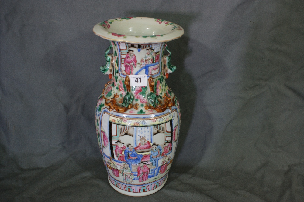 A Canton Circular Based Famille Rose Vase Decorated With Figural, Bird And Flower Panels. The Neck