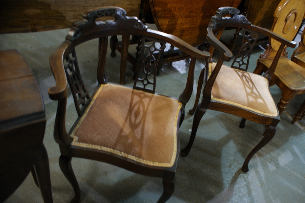 A Pair Of Edwardian Pierced Splat Back Corner Chairs On Cabriole Supports