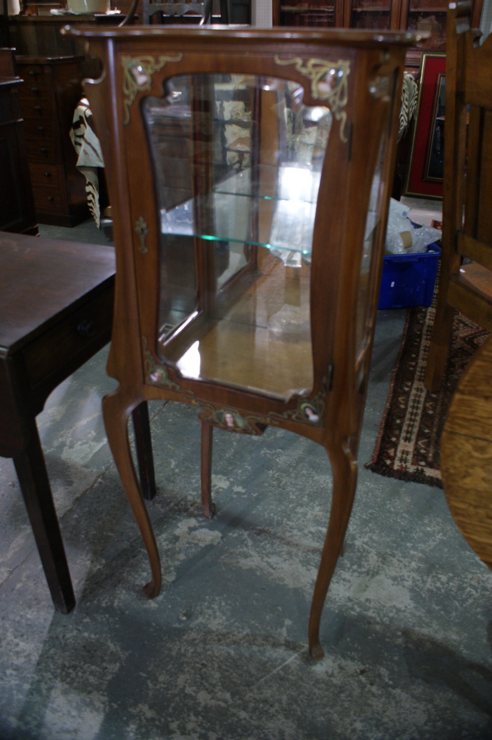 An Art Nouveau Period French Single Door Display Cabinet With Inset Porcelain Panels To The Corners,