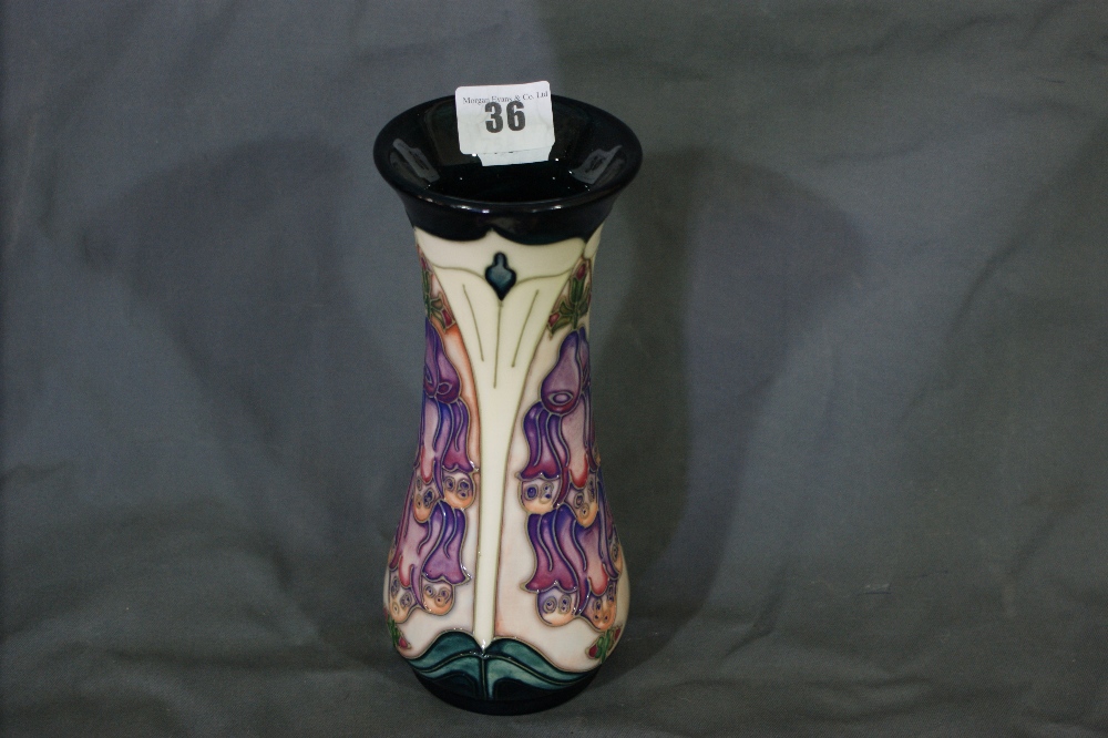 A Modern Moorcroft Foxglove Decorated Baluster Vase With Silver Mark