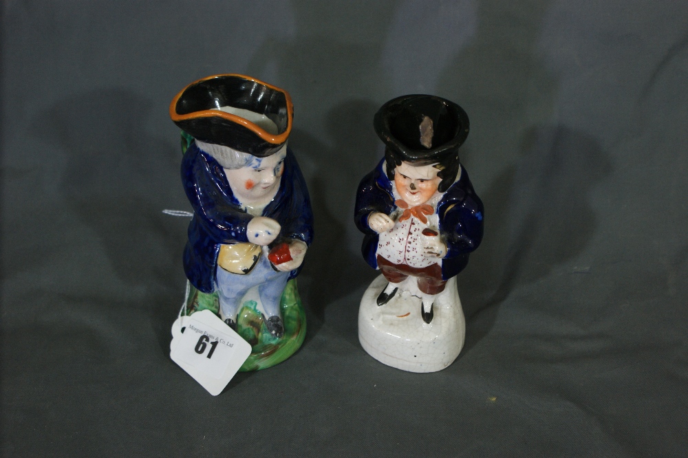 A Staffordshire Pottery Snuff Taker Toby Jug Together With A Similar Lidded Figure