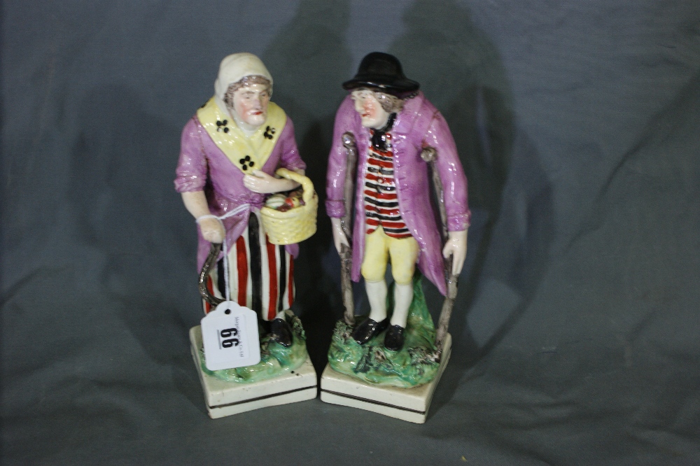 A Pair Of Staffordshire Pearl Ware Square Based Figures Of Elderly Rural Folk, 9" High