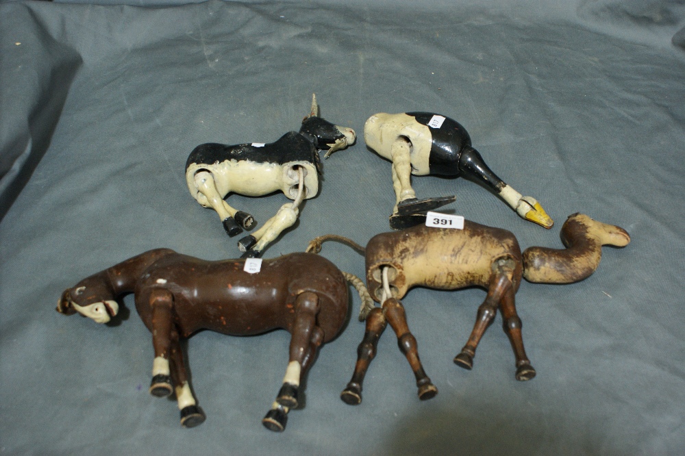 A Collection Of Early 20th Century Wooden Jointed Animal Puppets (4)
