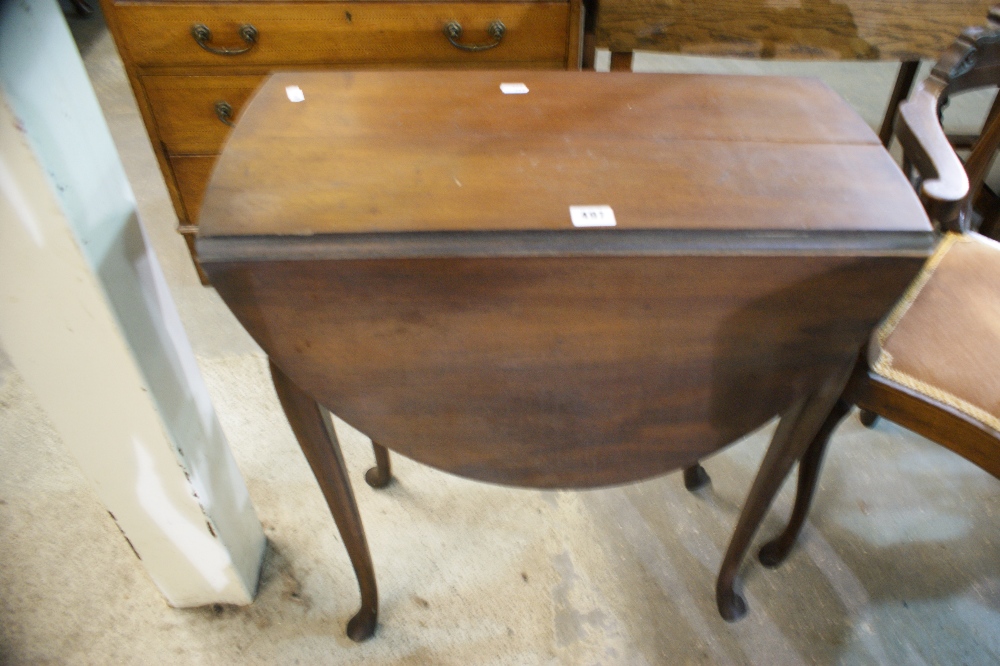 An Antique Mahogany Drop Leaf Occasional Table On Cabriole Supports