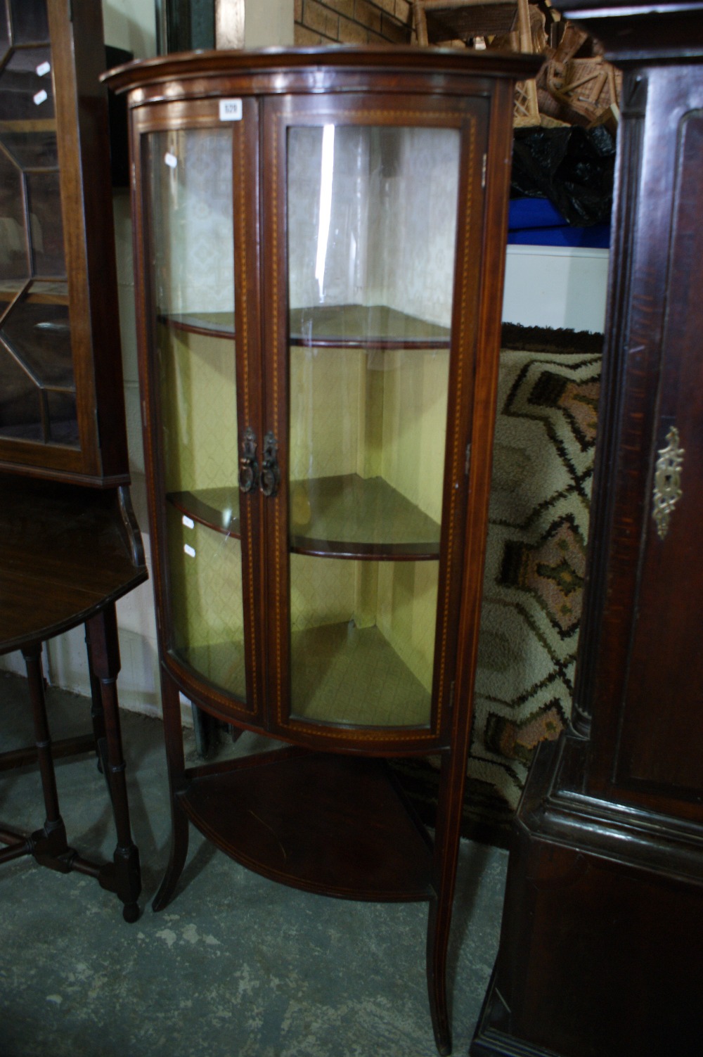 An Edwardian Mahogany And Inlaid Bow Front Two Door China Cabinet