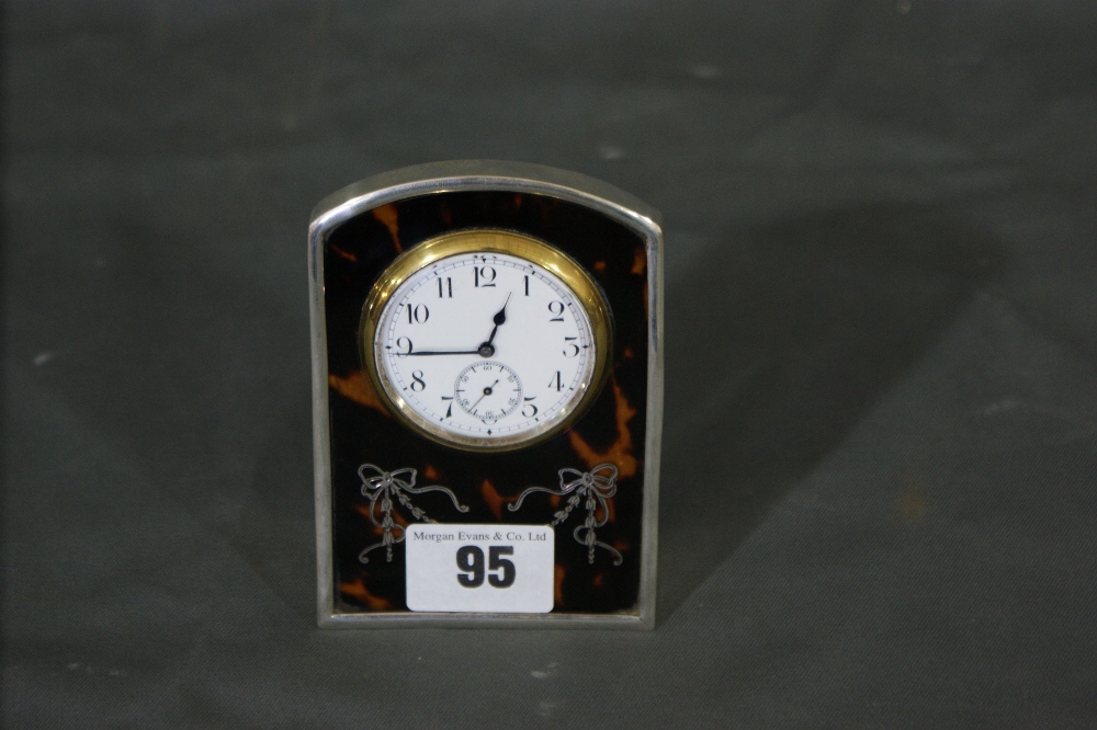 A Silver And Tortoise Shell Encased Desk Clock With Garland Decoration, Hallmarks For Birmingham