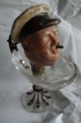 Sir Winston Churchill – papier mache bust of Churchill in nautical clothes^ smoking one of his