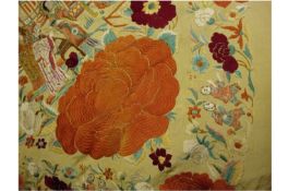 China a finely worked Chinese shawl featuring finely worked flower patterns with various scenes of