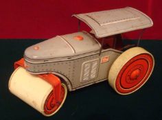 Tippco Tin Plate Clockwork Steam Roller: Grey and Red Steam Roller with C ream Wheels overall