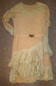 Ladies Dinner Dress: Beige and Lace dress having lace wrists and a metal buckle (please note hole