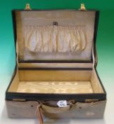 Early 20th Century Travel Case: Covered in Black leather with Cream silk lining have the NH in