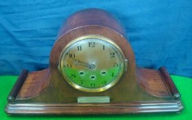 1920s Captain`s Hat Mantel Clock: Brass faced Mahogany Veneer with Scrolled Ends on Bun Feet, West