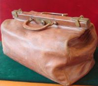 Leather Gladstone Bag: Having Brass fittings and leather covered Handles overall condition good (