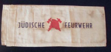 WWII – the Holocaust – Ghetto Fire Brigade armband featuring a red device to centre of a helmet with