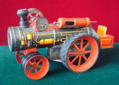 Nomura (TN) Japan Tinplate Steam Tractor: Good clean example with very bright lithography appears