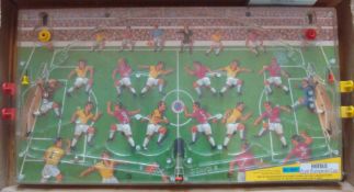 French Bagatelle Football Game: Large plastic case having 2 teams with the player kicks the ball