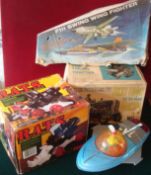 Collection of Battery Operated Toys: To include Marx Tricky Tommy Tractor, F111 Swing Wing