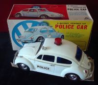 ALPS of Japan large scale plastic Volkswagen Beetle Police Car: Battery operated with mystery action