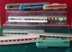 Collection of H0 Gauge Locomotives and Coaches: To include 4 Diesel Locomotives and 5 Coaches all