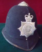 Metropolitan Police Helmet: Earlier Helmet complete with liner having chrome and Blue enamel