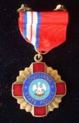 Louisiana State Police Life Saving Medal: Bronze and enamel radiant cross, 42mm in diameter on a