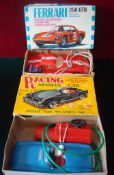 Two Plastic Battery Operated Remote Cars: Ferrari 250 GTO Forward and Reverse with horn and