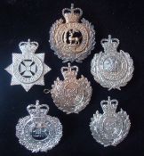 Selection of Queens Crown Police Helmet Plates: To consist of smaller examples for Devon, South