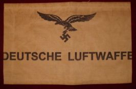 WWII Deutsche Luftwaffe armband type 2: Stamp printed Black on White having show through on