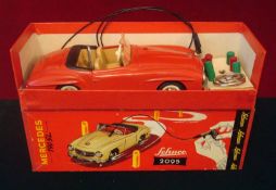 Schuco No.2095 Mercedes 190SL: Red, tinplate body and base, beige plastic interior with detailed