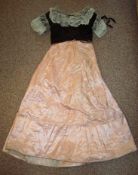 Ladies 2 Piece Skirt and Jacket: Salmon Pink Silk floor length Skirt together with a Black and