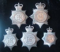 Selection of Queens Crown Police Helmet Plates: To consist of Humberside, Merseyside, Dorset &