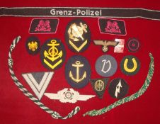 Selection of German Cloth and Metal Badges: To include Cap Badge, Collier Badges, Cuff Badge, German