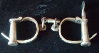 Late 19th / early 20th Century Handcuffs: Made from heavy steel complete with Key having no makers