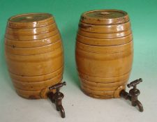 Pair of early 20th Century Stoneware Barrels: Pair of light brown glazed stoneware barrels with