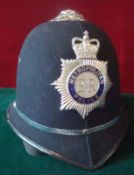 Metropolitan Police Helmet: Earlier Helmet complete with liner having chrome and Blue enamel