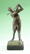 Large modern Spelter golfing figure of lady swinging a club – on a square naturalistic base