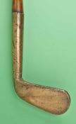 An unusual, unknown small brass smf lofting iron c1885 with a sharp neck crease and 4.75” hosel