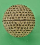 A small bramble pattern gutty golf ball c1890 – retaining some of the original white finish, used,