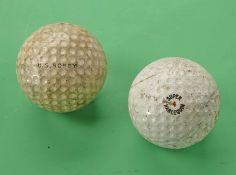 2x dimple golf balls – to incl a Super Harlequin (with visible strike marks) and a US Nobby Re-