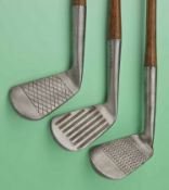3x various Tom Stewart face pattern irons to incl a interesting deep grooved mashie stamped Tom
