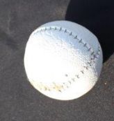 Kaatsen white leather ball – with two stitched seams, appears unused. This ball is used in the old