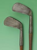 2x early Tom Stewart made deep smf mashies c1890s – both with the early pipe mark, one stamped