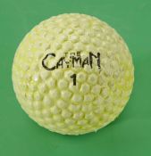 The Cayman (Cayman Islands) light weight yellow bramble golf ball c1980 – stamped “PGA First