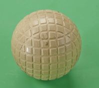 A fine oversized unnamed Clent square mesh gutty golf ball – retaining 90% original white finish