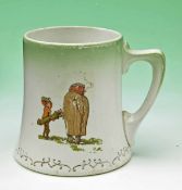 Ceramic green and white golfing tankard c1900 with coloured transfer golfing scene – a firing