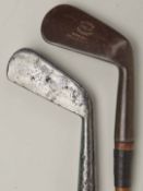 2x smf irons to incl a driving cleek stamped Carrick to the head, some pitting to the face and hosel