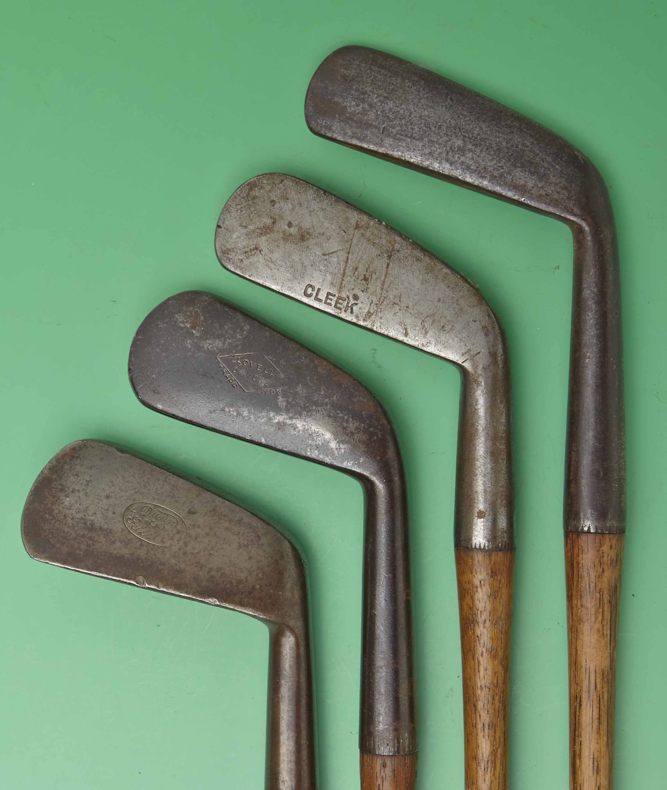 4x various smf irons to incl a Carruthers patent bore thro’ short hosel cleek, a mashie stamped Dunn